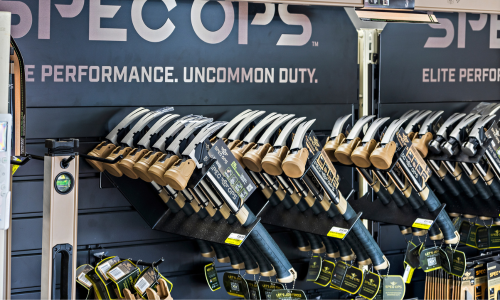 Our selection of Spec Ops hammers hanging on a wall in our tool department.